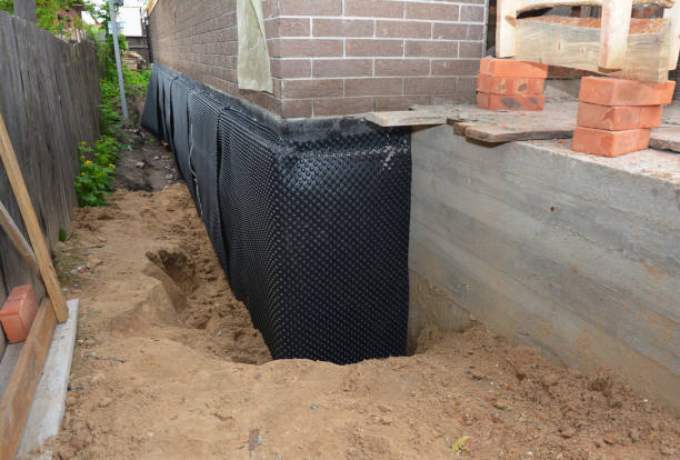 SJ Waterproofing Pros technician performing targeted Waterproofing assessment in New Waverly, IN